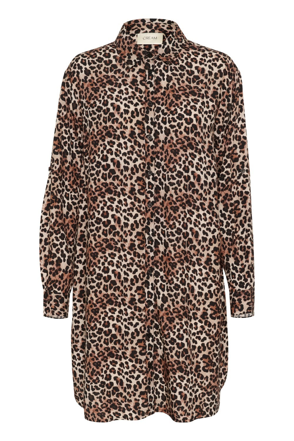 Unleash your wild side with our Cream Tiah Shirt Dress, featuring a playful leopard print. Made from lightweight material, this dress is perfect for casual days and nights. (Liven up your wardrobe with a touch of feline fun!)