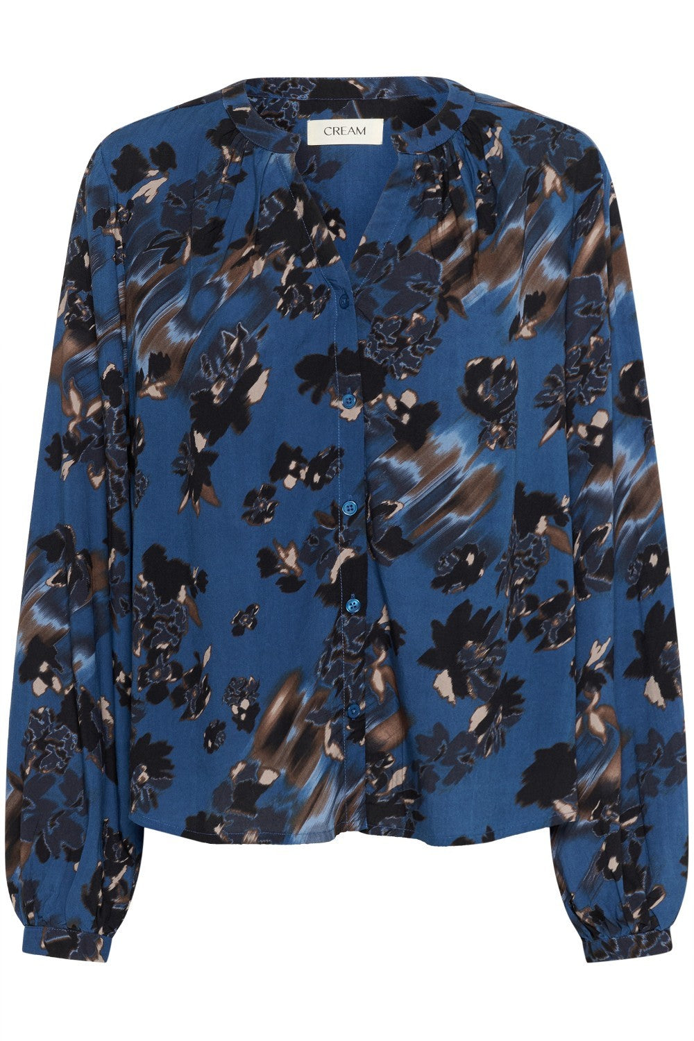 Blue floral patterned blouse on a white background