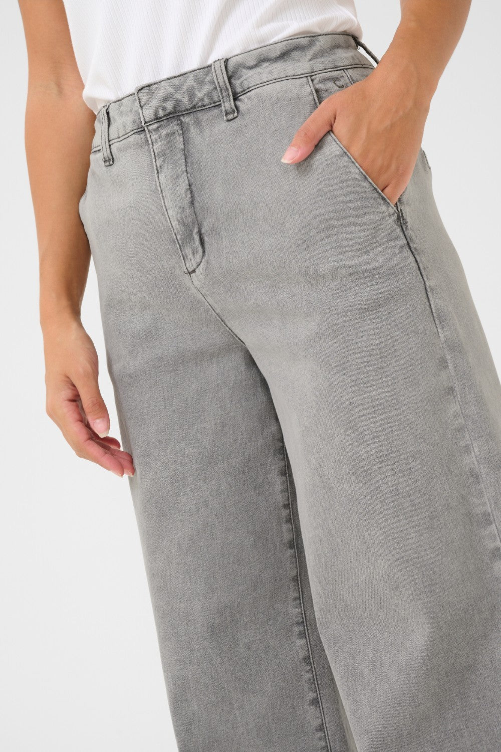 Elevate your style with our Cream Visti Pants! Featuring a wide leg design, these trousers exude sophistication and comfort in equal measure. Say goodbye to restrictive skinny jeans and hello to a trendy, relaxed denim look. Dress them up or down for any occasion!