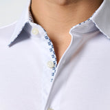 The Desoto Print Short Sleeve Kent Collar is a jersey shirt designed for maximum comfort, featuring a unique cut that allows for unlimited freedom of movement. Enjoy unparalleled comfort and ease of movement with this expertly designed jersey shirt.