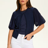 This versatile layering piece adds a touch of elegance to any outfit. The lightweight fabric provides a comfortable fit, while the sheer elbow length sleeves offer a stylish look. Perfect for dressing up or down, this cardigan is a must-have for any wardrobe.