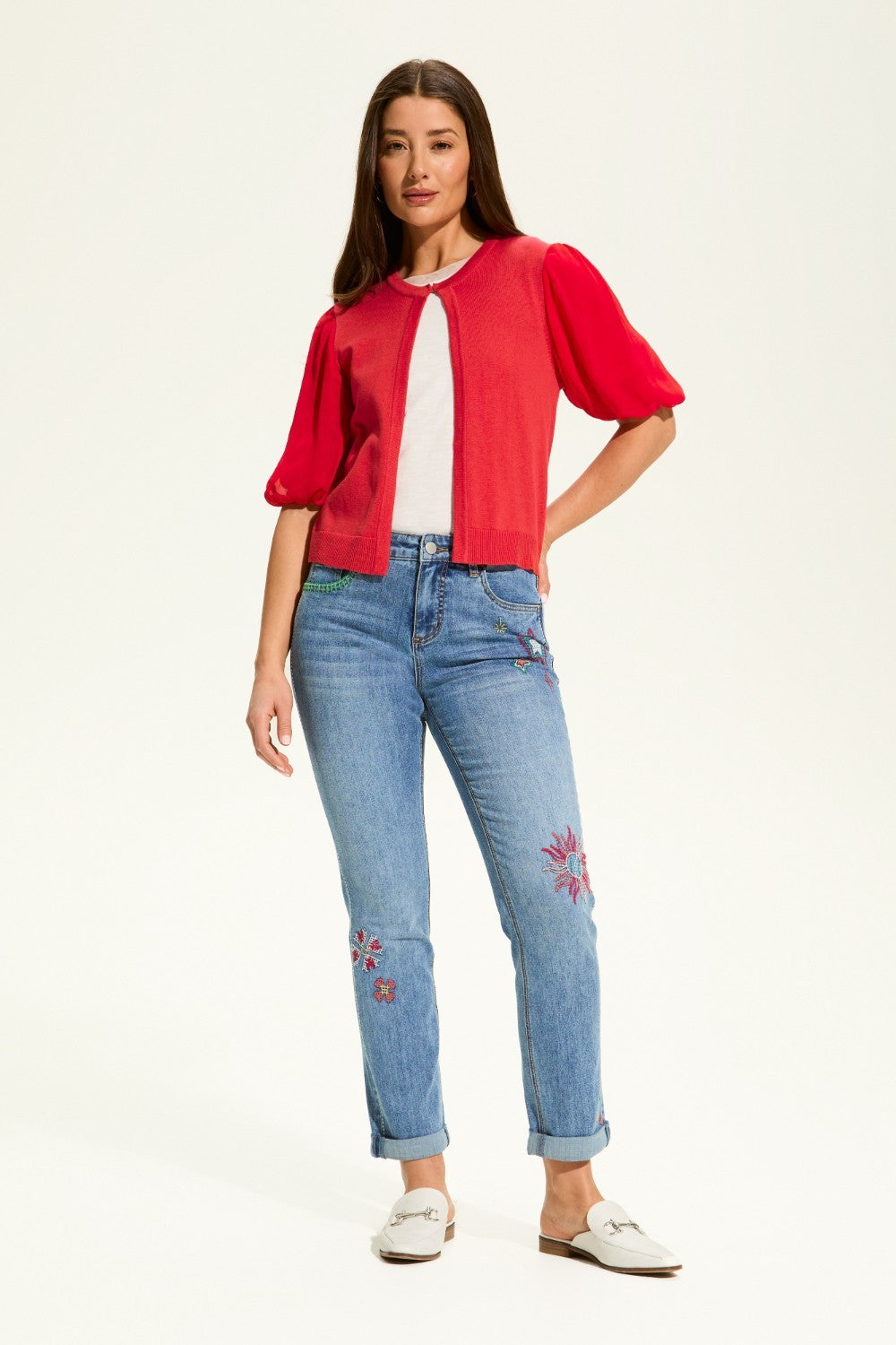 This versatile layering piece adds a touch of elegance to any outfit. The lightweight fabric provides a comfortable fit, while the sheer elbow length sleeves offer a stylish look. Perfect for dressing up or down, this cardigan is a must-have for any wardrobe.