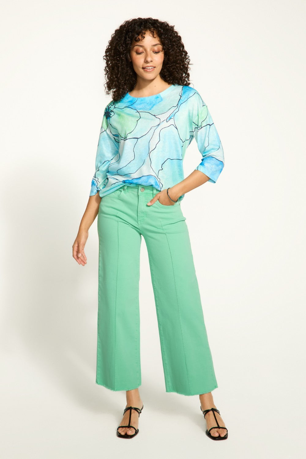 Introducing the FDJ Olivia Wide Ankle pants, designed to elevate your everyday style with its pintuck detailing and frayed bottom. These jeans are perfect for adding a touch of sophistication and edge to any outfit. Get ready to stand out from the crowd and make a statement with the FDJ Olivia Wide Ankle jeans!