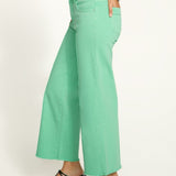 Introducing the FDJ Olivia Wide Ankle pants, designed to elevate your everyday style with its pintuck detailing and frayed bottom. These jeans are perfect for adding a touch of sophistication and edge to any outfit. Get ready to stand out from the crowd and make a statement with the FDJ Olivia Wide Ankle jeans!