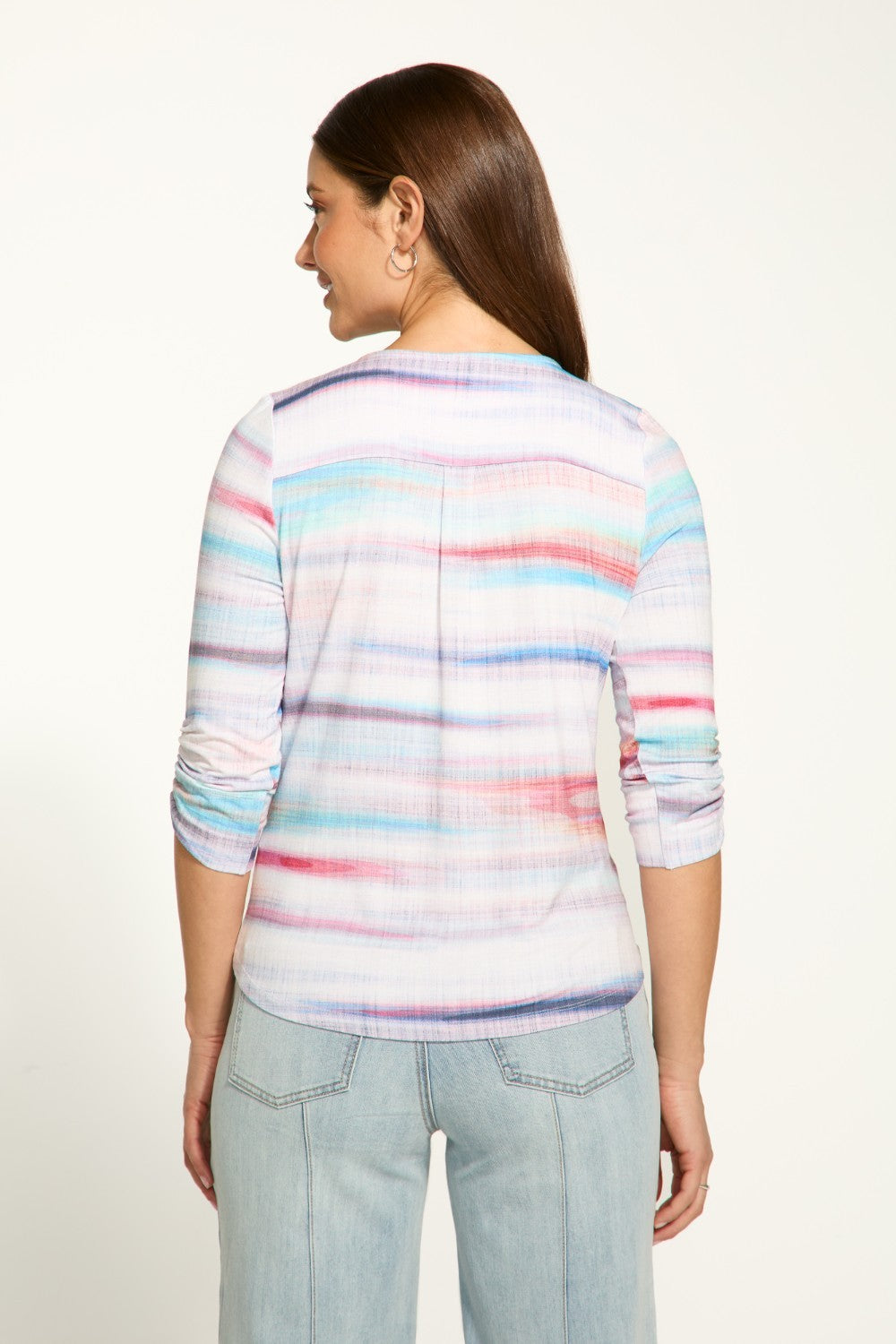 Get ready to wrap yourself up in the playful and soft FDJ Wrap Top! In vibrant colours, this top features rushe detailing at the 3/4 sleeves and a brilliant stitch at the top of the wrap to ensure it stays in place. Fun and comfortable, this top is sure to make a statement!