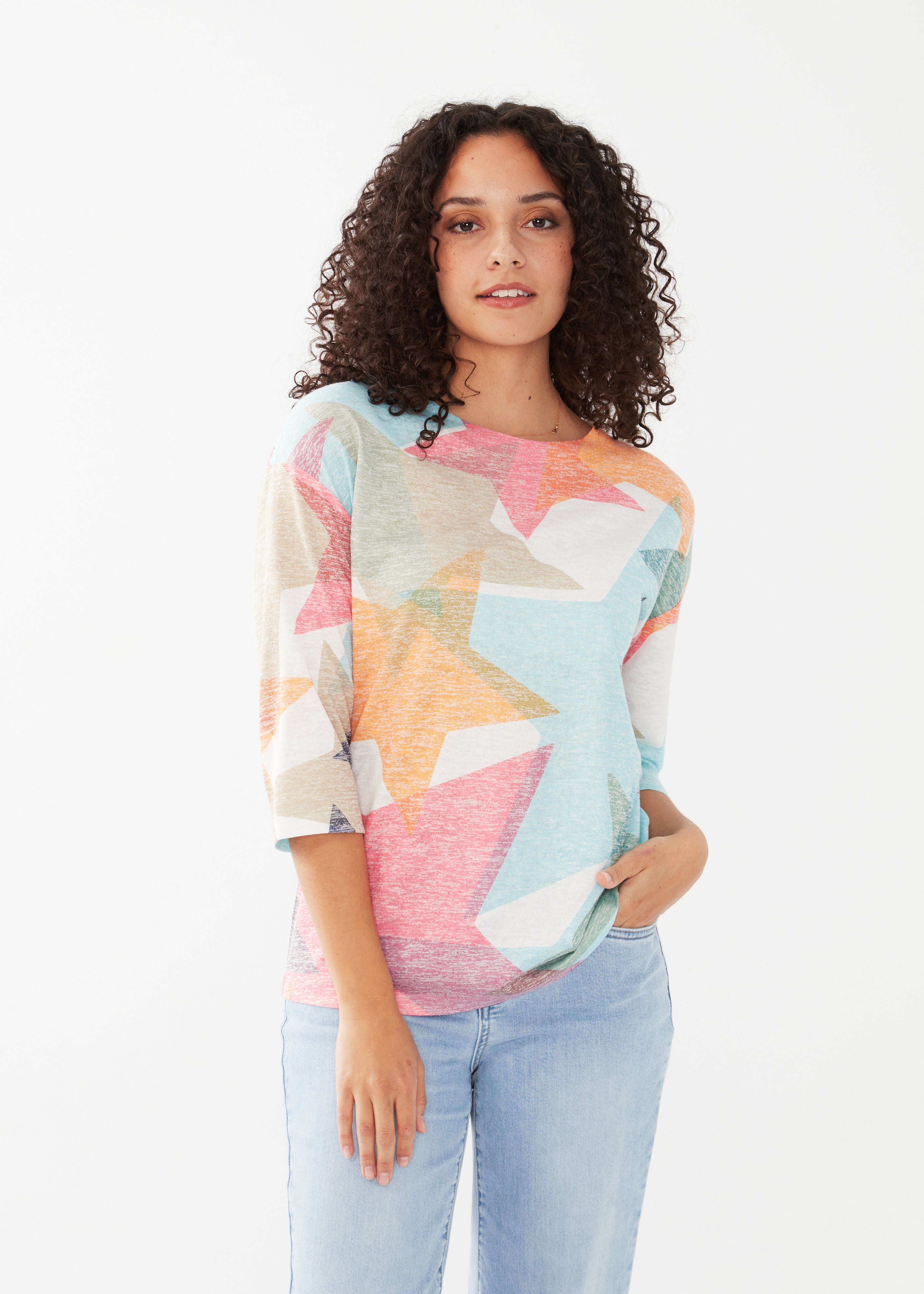 Spruce up your wardrobe with our FDJ 3/4 Sleeve Drop Shoulder Top featuring a playful star print in multiple colours. Stand out from the crowd and show off your unique style in this quirky and fun top. (You'll look like a star - pun intended!)