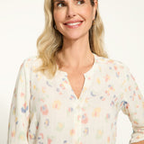 Elevate your wardrobe with our FDJ Smocked Sleeve Shirt. The subtle leopard print adds a touch of sophistication to any outfit, while the full button front allows for versatile styling options. Perfect for the fashion-forward individual looking to make a statement with their wardrobe.