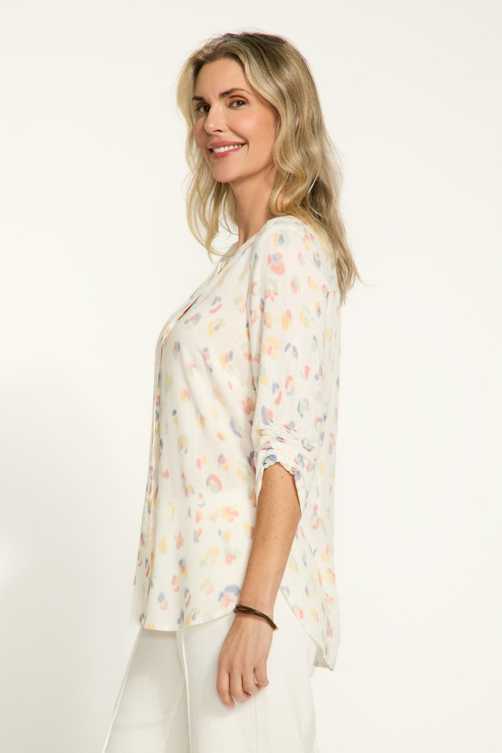 Elevate your wardrobe with our FDJ Smocked Sleeve Shirt. The subtle leopard print adds a touch of sophistication to any outfit, while the full button front allows for versatile styling options. Perfect for the fashion-forward individual looking to make a statement with their wardrobe.
