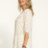 Elevate your wardrobe with our FDJ Smocked Sleeve Shirt. The subtle leopard print adds a touch of sophistication to any outfit, while the full button front allows for versatile styling options. Perfect for the fashion-forward individual looking to make a statement with their wardrobe.