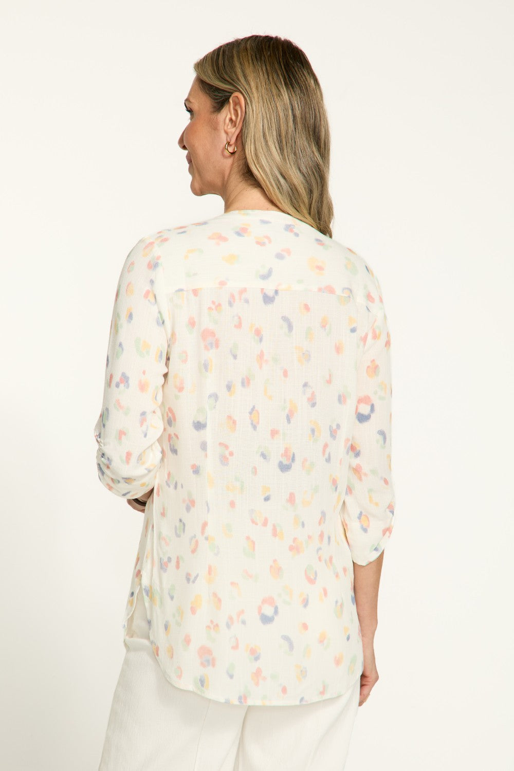 Elevate your wardrobe with our FDJ Smocked Sleeve Shirt. The subtle leopard print adds a touch of sophistication to any outfit, while the full button front allows for versatile styling options. Perfect for the fashion-forward individual looking to make a statement with their wardrobe.