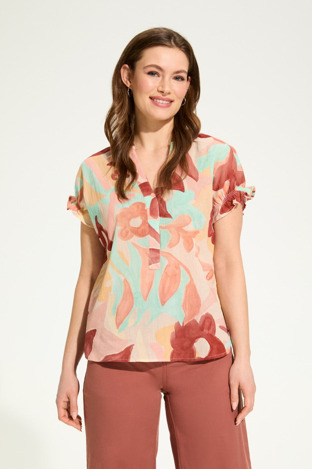 Stay cool with the FDJ Crinkle Printed Blouse. Made from 100% cotton, this floral print top is perfect for any casual occasion. Its crinkle texture adds a unique touch that will make you stand out in style.