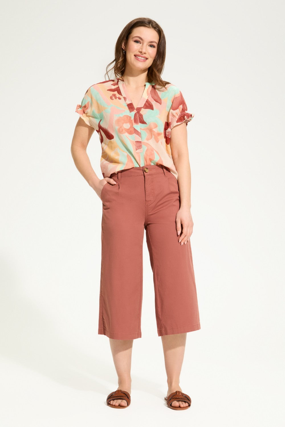 Stay cool with the FDJ Crinkle Printed Blouse. Made from 100% cotton, this floral print top is perfect for any casual occasion. Its crinkle texture adds a unique touch that will make you stand out in style.