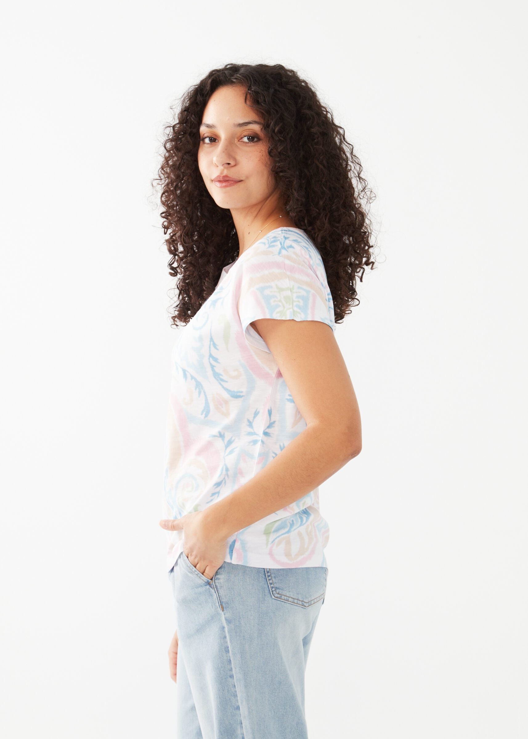 This playful top's dolman short sleeves add a touch of whimsy to your outfit. With its soft jersey fabric, you'll be comfortable and stylish all day long. Perfect for a day out with friends or a casual weekend look.