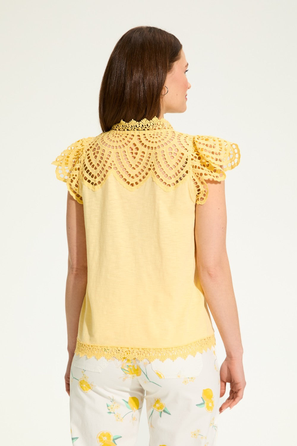 Brighten up your wardrobe with the FDJ Flutter Sleeve Placed Eyelet Top! This solid yellow top is sure to add a pop of colour to any outfit, making you look and feel cheery all day long. Don't miss out on this pretty piece.
