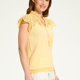 Brighten up your wardrobe with the FDJ Flutter Sleeve Placed Eyelet Top! This solid yellow top is sure to add a pop of colour to any outfit, making you look and feel cheery all day long. Don't miss out on this pretty piece.