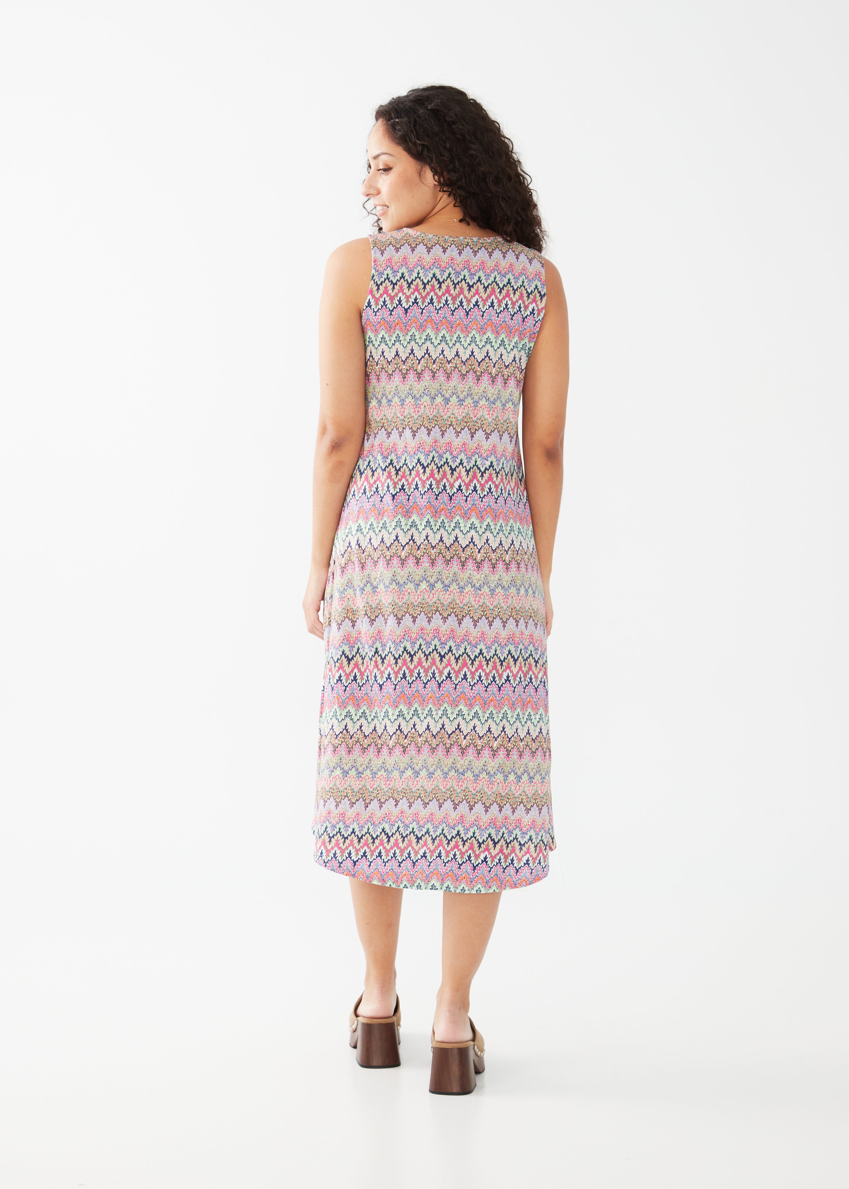 Get ready to turn heads in our FDJ Lace Up Detail Dress! Featuring a faux crochet stripe design and a playful mix of multi-colour, this dress is the perfect combination of style and comfort. Rock this dress and make a statement wherever you go! (Warning: may cause outfit envy)