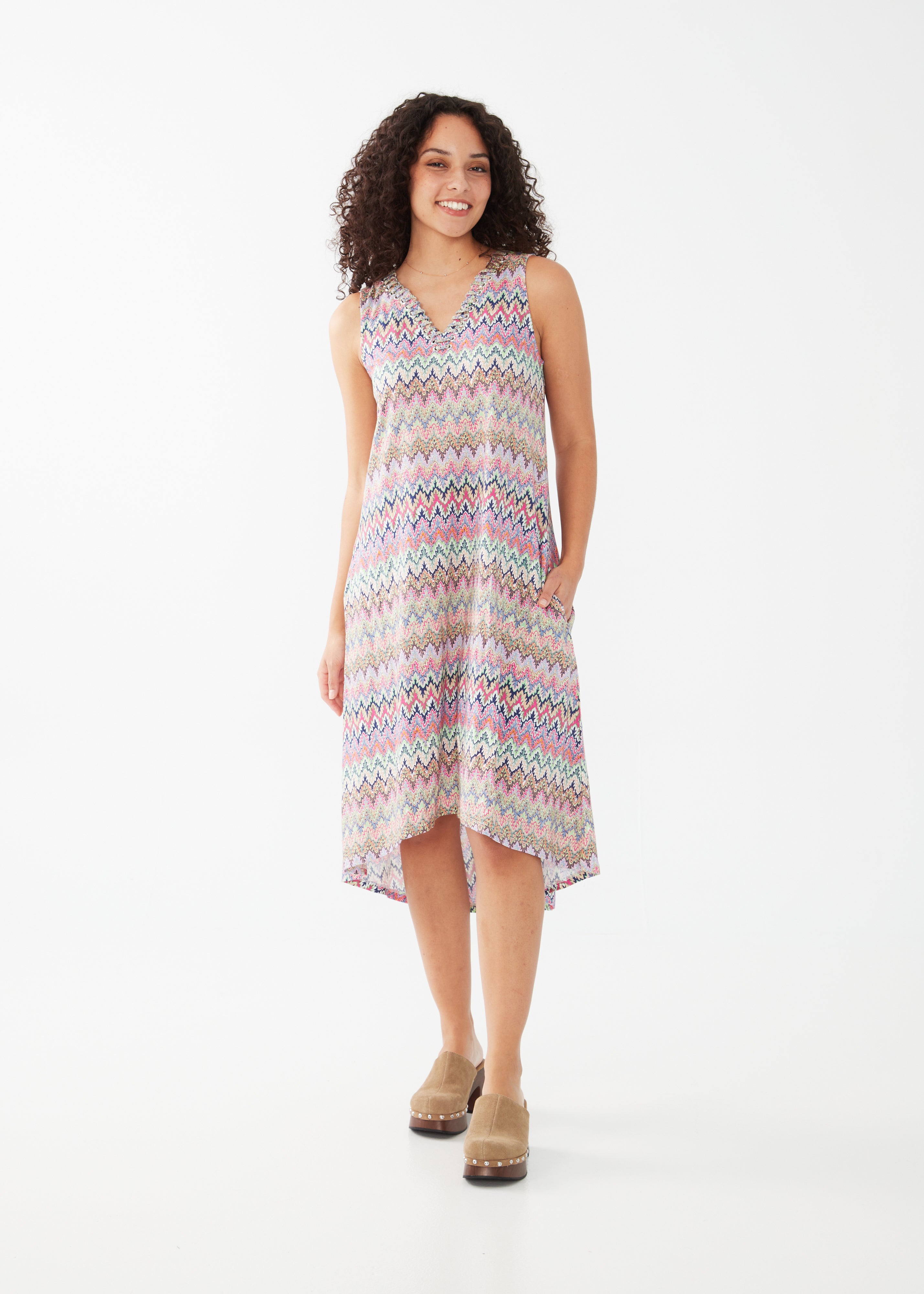 Get ready to turn heads in our FDJ Lace Up Detail Dress! Featuring a faux crochet stripe design and a playful mix of multi-colour, this dress is the perfect combination of style and comfort. Rock this dress and make a statement wherever you go! (Warning: may cause outfit envy)