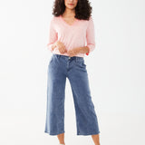 Get ready to feel comfy in our FDJ Pull-On Wide Leg Crop. The soft fabric and elastic waist provide maximum comfort, while the zipper and button closure make for easy wearing. Perfect for those off-duty days or lounging at home (and looking stylish while doing it). No one said fashion had to be uncomfortable!