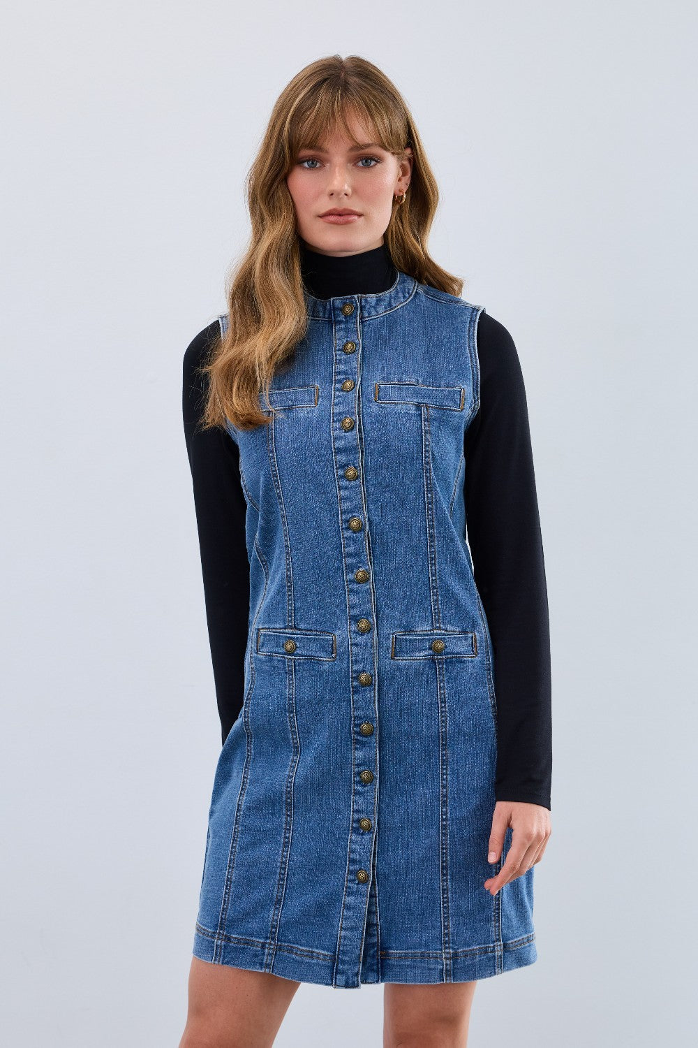 The FDJ Long Denim Vest offers versatile style—wear it as a vest or dress for a casual, effortless look. Featuring a full button front, it’s easy to layer or wear on its own, making it a practical addition to your wardrobe. Comfortable and adaptable, this piece supports your everyday style with ease.