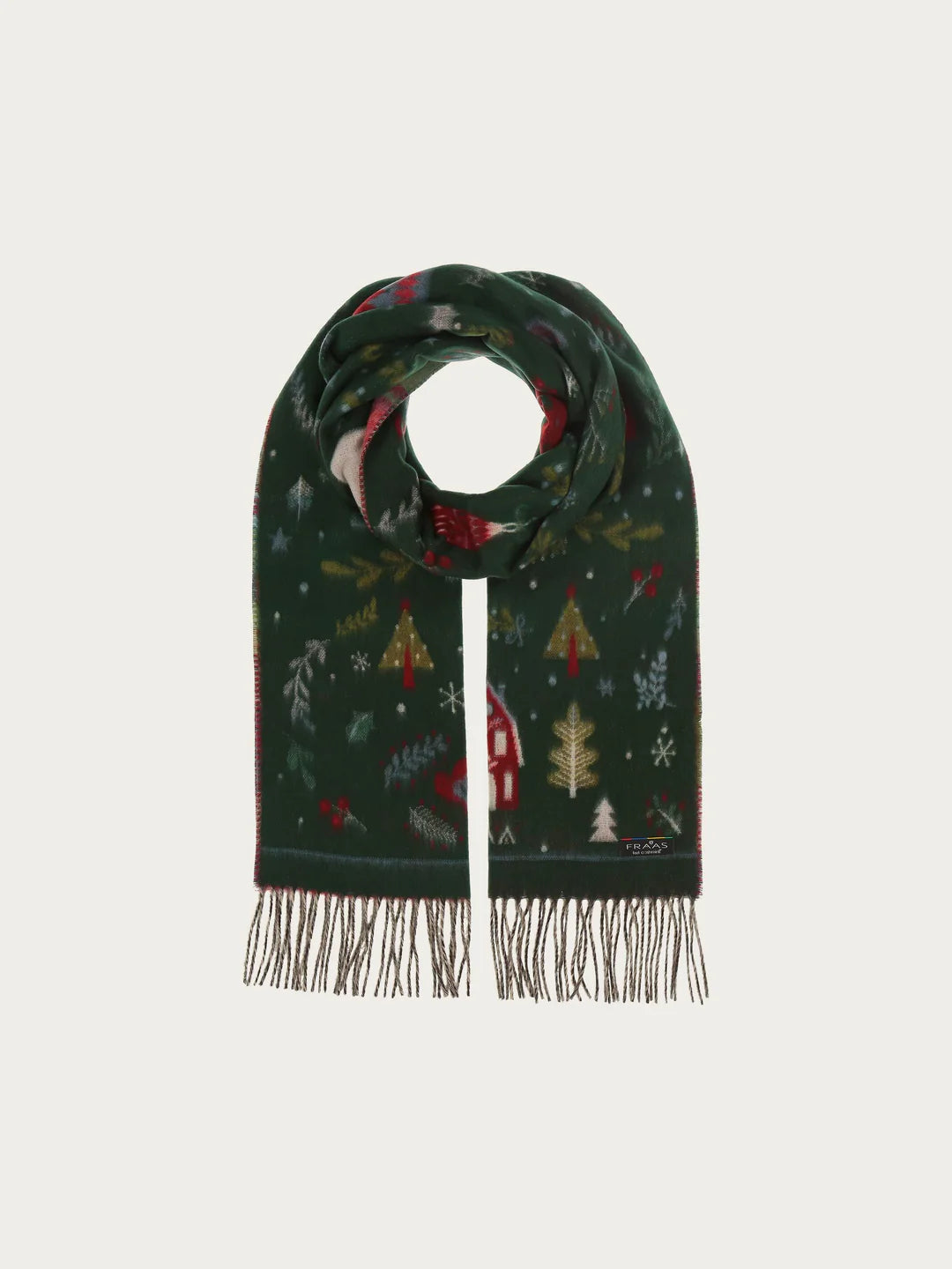 Christmas can come! The scarf with cheerful Christmas motifs from FRAAS spreads good cheer and creates a Christmas atmosphere. The woven scarf is 35 x 200 cm in size and made of extra soft cashmink, the specialty from FRAAS. Keeps out the cold and moisture and is also suitable for allergy sufferers. The scarf MADE IN GERMANY is the ideal companion for everyone who loves Christmas.