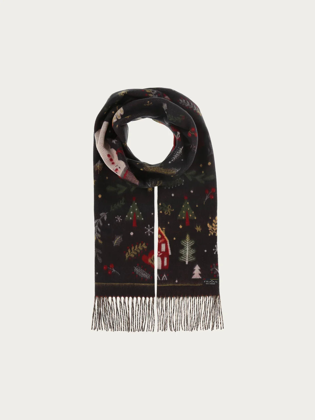 Christmas can come! The scarf with cheerful Christmas motifs from FRAAS spreads good cheer and creates a Christmas atmosphere. The woven scarf is 35 x 200 cm in size and made of extra soft cashmink, the specialty from FRAAS. Keeps out the cold and moisture and is also suitable for allergy sufferers. The scarf MADE IN GERMANY is the ideal companion for everyone who loves Christmas.