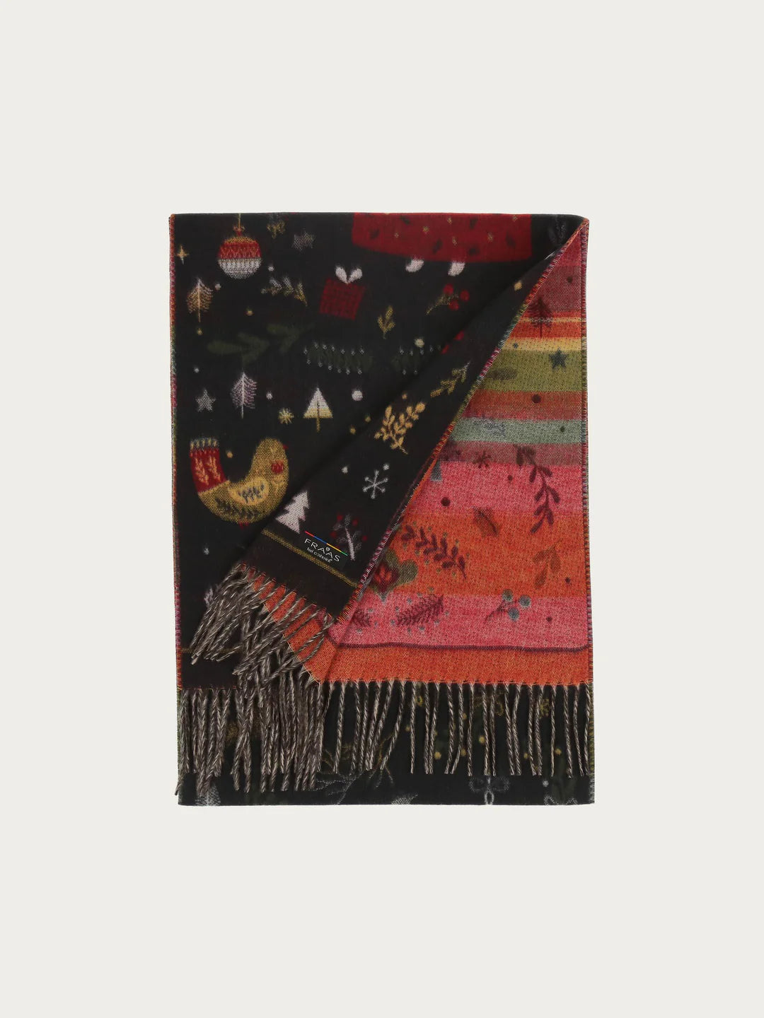 Christmas can come! The scarf with cheerful Christmas motifs from FRAAS spreads good cheer and creates a Christmas atmosphere. The woven scarf is 35 x 200 cm in size and made of extra soft cashmink, the specialty from FRAAS. Keeps out the cold and moisture and is also suitable for allergy sufferers. The scarf MADE IN GERMANY is the ideal companion for everyone who loves Christmas.