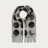 XXL dots all over! We love the cheerful scarf with extra large dots made of pure cashmink - MADE IN GERMANY. It is comfortable to wear: warm, cuddly soft and gentle on the skin. The scarf can be perfectly and easily combined with different styles. Bring your outfit to the point.