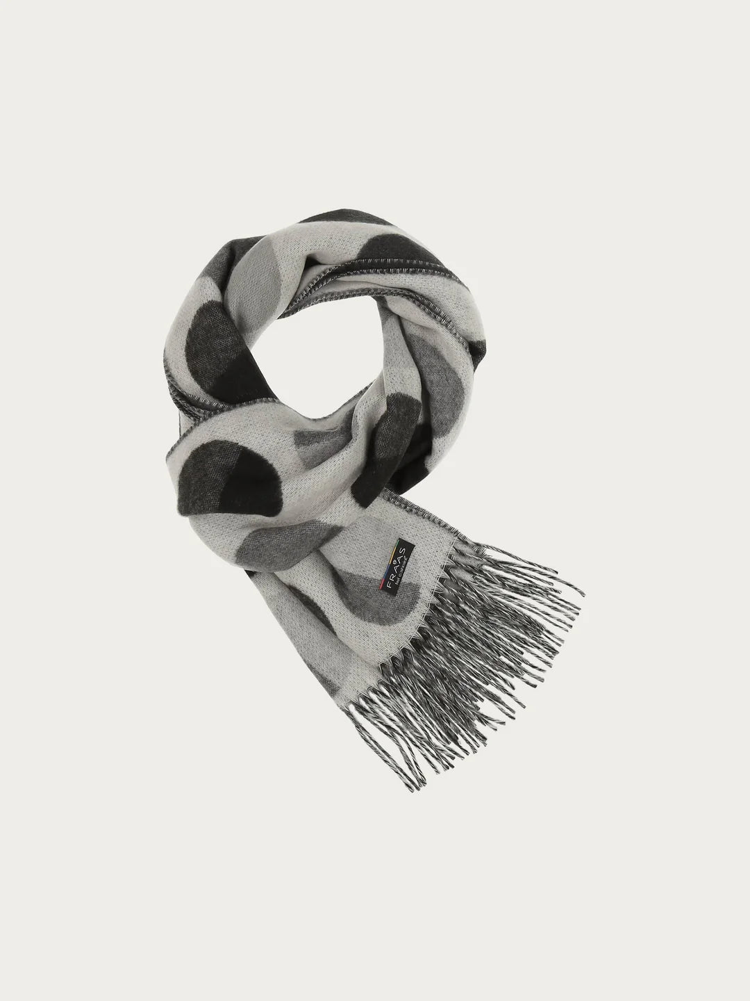 XXL dots all over! We love the cheerful scarf with extra large dots made of pure cashmink - MADE IN GERMANY. It is comfortable to wear: warm, cuddly soft and gentle on the skin. The scarf can be perfectly and easily combined with different styles. Bring your outfit to the point.