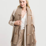Elegant accessory for the cold season: The stole with window pane check perfects every outfit. Thanks to the sophisticated colour change in the stripes, it looks as if the yarn is shimmering. Combine the scarf with an elegant blazer, a winter coat or a sweater and jeans. With its 65 x 195 cm, the FRAAS stole can do anything and always looks good.