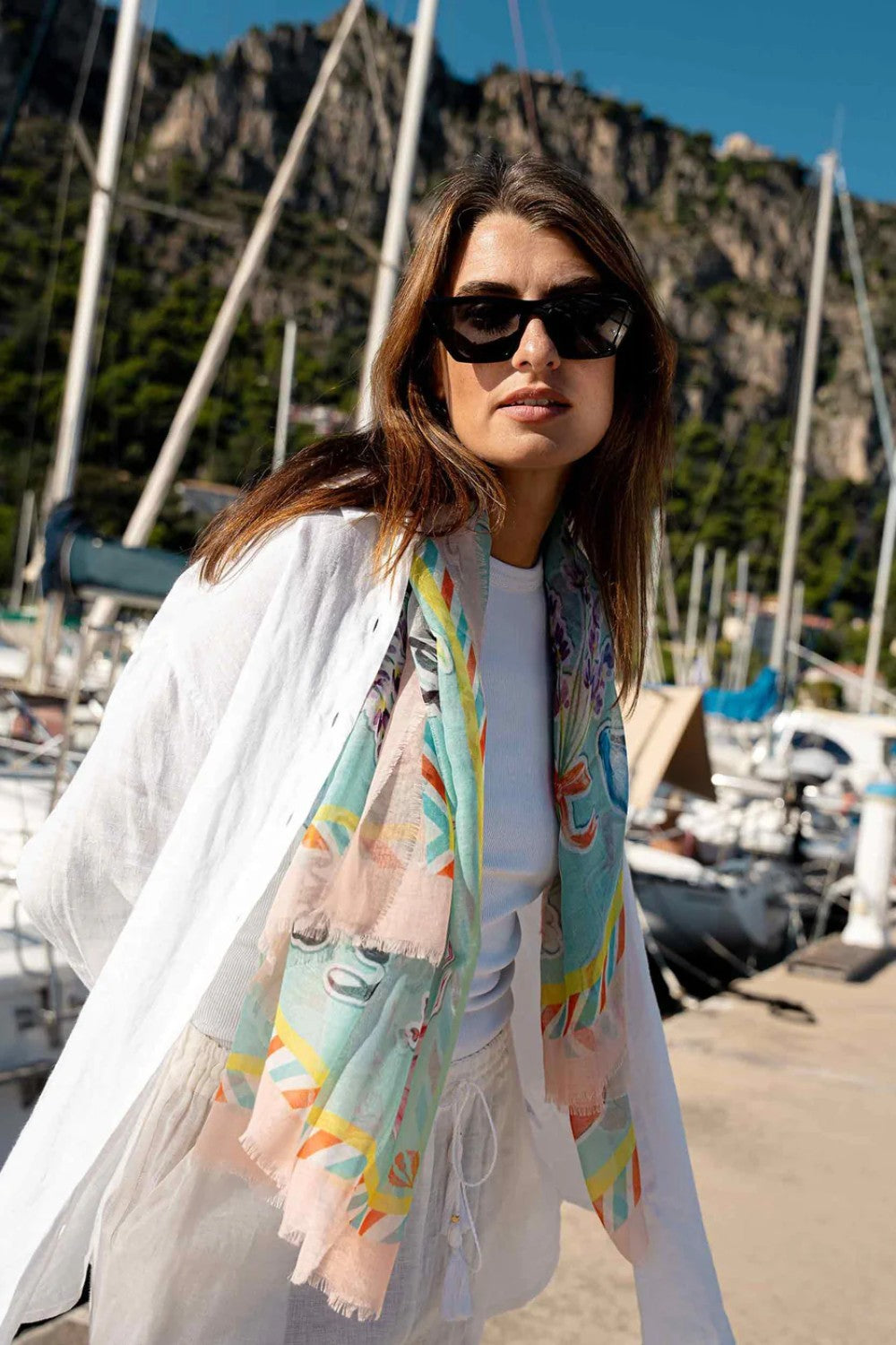 The style this season is to be fashionably sustainable! The fibers in this chic Paris inspired print have been recycled from plastic bottles. Try this versatile oversized square as a bold bandana, chic shawl, fashionable tie, or elegant headscarf. Pairs well with your favourite jeans, fashion dresses or work blazer. A fabulous fashion accessory that is Good for you. Good for the planet.