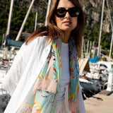 The style this season is to be fashionably sustainable! The fibers in this chic Paris inspired print have been recycled from plastic bottles. Try this versatile oversized square as a bold bandana, chic shawl, fashionable tie, or elegant headscarf. Pairs well with your favourite jeans, fashion dresses or work blazer. A fabulous fashion accessory that is Good for you. Good for the planet.