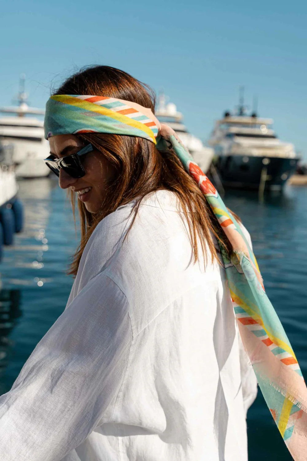 The style this season is to be fashionably sustainable! The fibers in this chic Paris inspired print have been recycled from plastic bottles. Try this versatile oversized square as a bold bandana, chic shawl, fashionable tie, or elegant headscarf. Pairs well with your favourite jeans, fashion dresses or work blazer. A fabulous fashion accessory that is Good for you. Good for the planet.