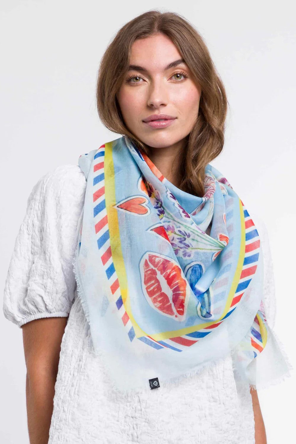 The style this season is to be fashionably sustainable! The fibers in this chic Paris inspired print have been recycled from plastic bottles. Try this versatile oversized square as a bold bandana, chic shawl, fashionable tie, or elegant headscarf. Pairs well with your favourite jeans, fashion dresses or work blazer. A fabulous fashion accessory that is Good for you. Good for the planet.