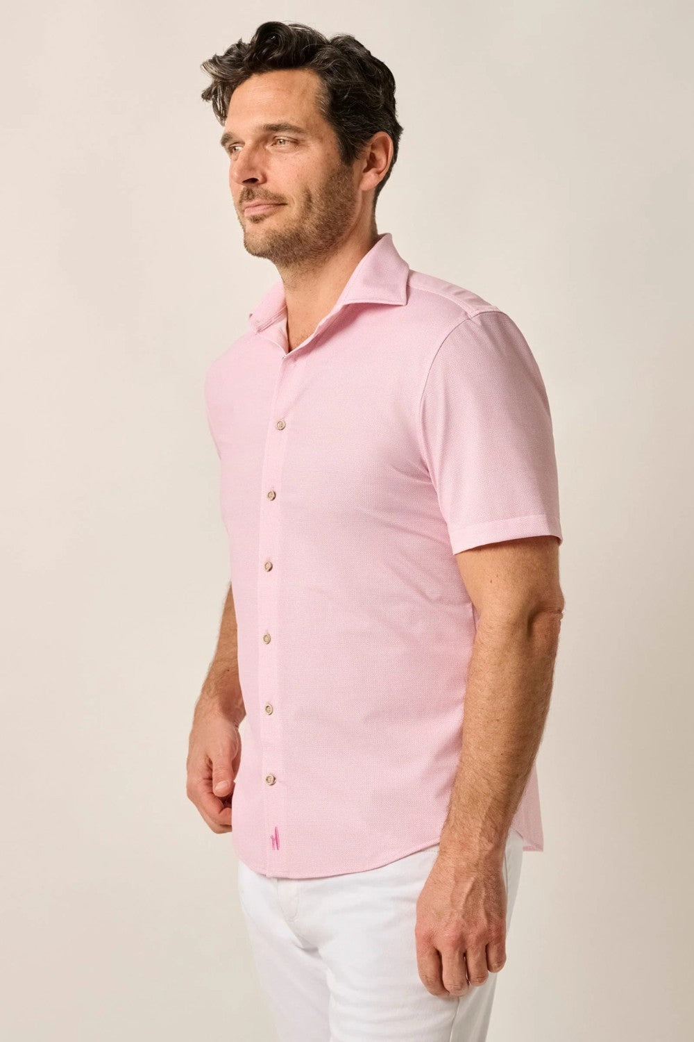 This knit button-up from our Hangin' Out Collection—which is designed to look its best untucked—is made with an incredible soft, and breathable blend of nylon and spandex. This is how you do elevated casual while staying completely comfortable.