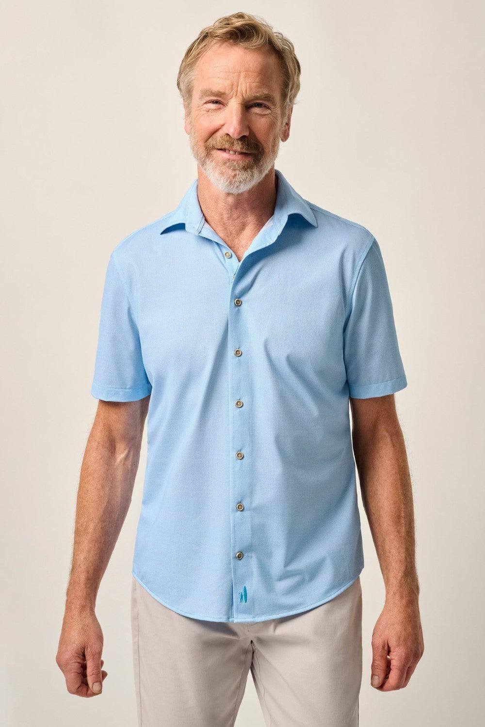 This knit button-up from our Hangin' Out Collection—which is designed to look its best untucked—is made with an incredible soft, and breathable blend of nylon and spandex. This is how you do elevated casual while staying completely comfortable.