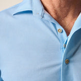 This knit button-up from our Hangin' Out Collection—which is designed to look its best untucked—is made with an incredible soft, and breathable blend of nylon and spandex. This is how you do elevated casual while staying completely comfortable.