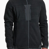 Black fleece jacket worn by a person on a white background