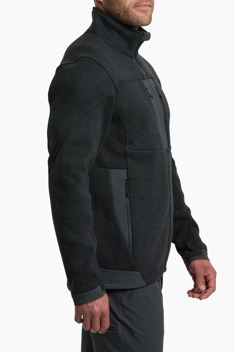 Man wearing a black jacket with a white background