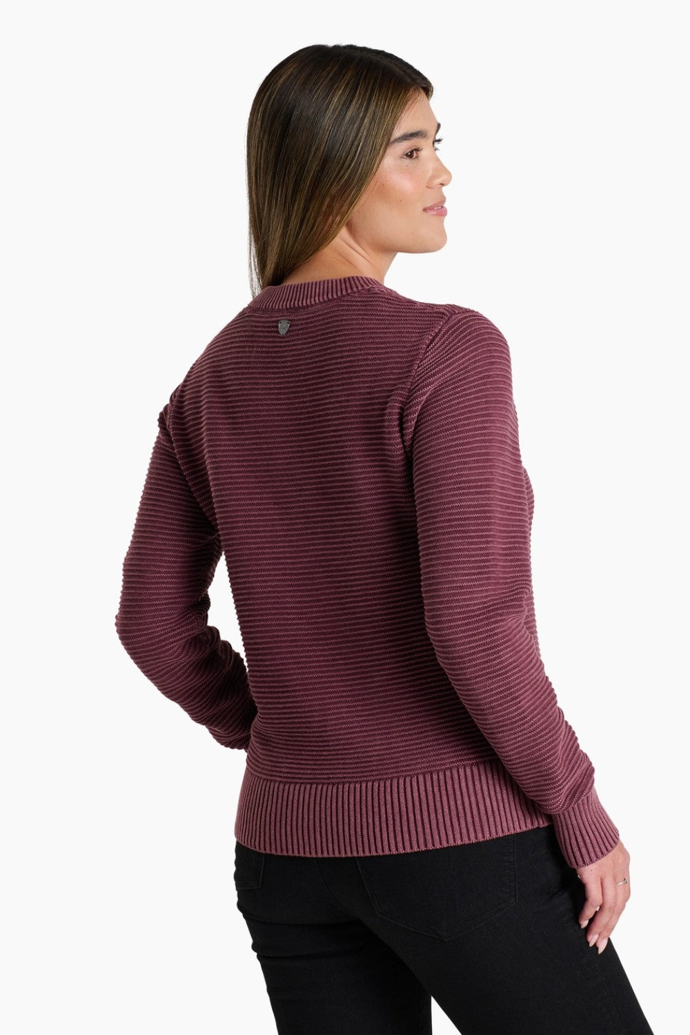 Woman wearing a maroon sweater on a white background