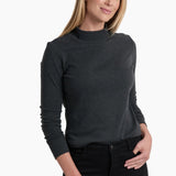 Woman wearing a dark gray long-sleeve top and black pants on a white background