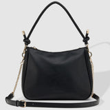 The Louenhide Baby Remi Shoulder Bag is a classic women's everyday bag with elevated style. Designed in a soft and slouchy silhouette with smooth vegan leather, this casual hobo bag is sure to turn heads with its timeless knot detailing strap feature.