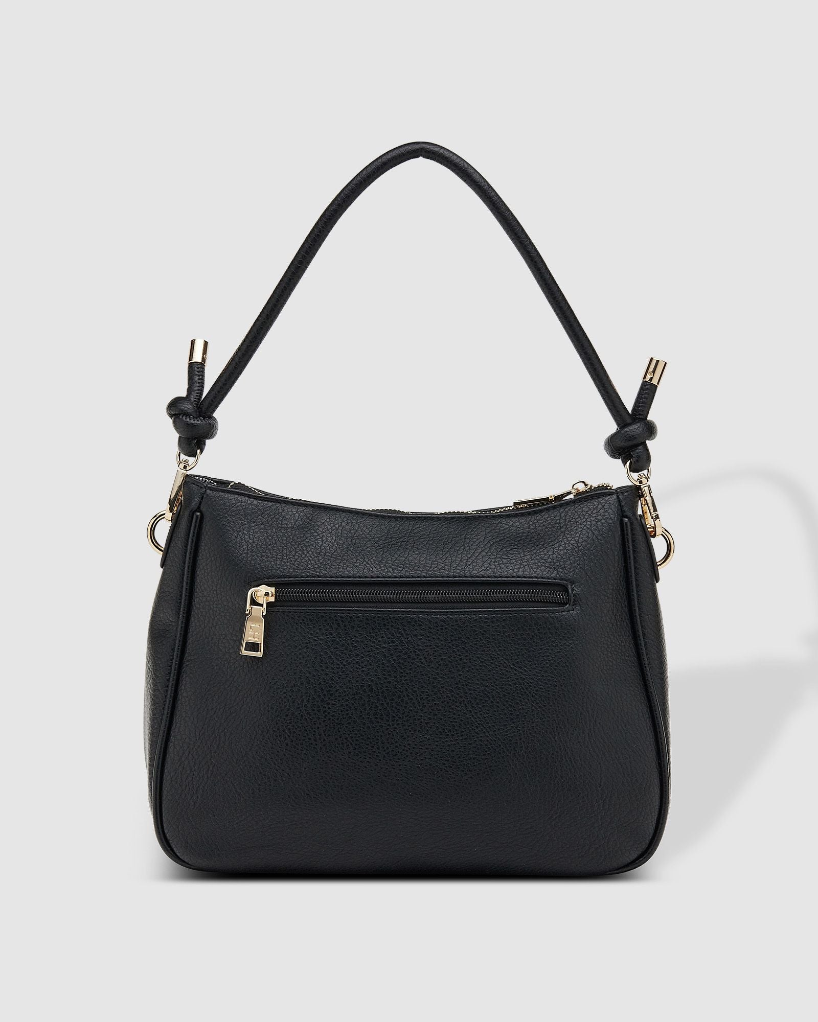 The Louenhide Baby Remi Shoulder Bag is a classic women's everyday bag with elevated style. Designed in a soft and slouchy silhouette with smooth vegan leather, this casual hobo bag is sure to turn heads with its timeless knot detailing strap feature.