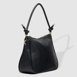 The Louenhide Baby Remi Shoulder Bag is a classic women's everyday bag with elevated style. Designed in a soft and slouchy silhouette with smooth vegan leather, this casual hobo bag is sure to turn heads with its timeless knot detailing strap feature.