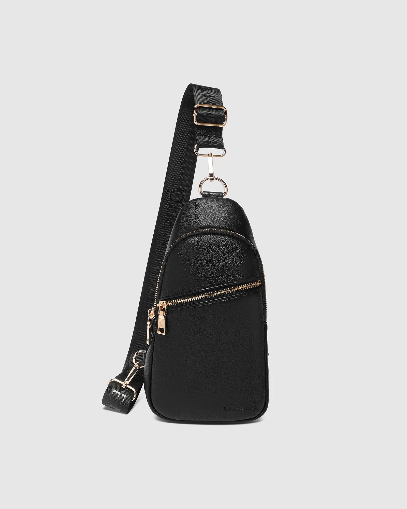 The Louenhide Bella Sling Bag is designed with both style and functionality in mind. Travel organization has never been easier with the dual compartment design ensuring your valuables are within reach and secured safely with the zip closures. Featuring an adjustable and detachable strap allows you to choose the way your bag slings. Whether over your left or right shoulder, this faux leather sling bag ensures comfortable all-day wear. This small sling backpack adds a refined touch to any casual outfit, enhan
