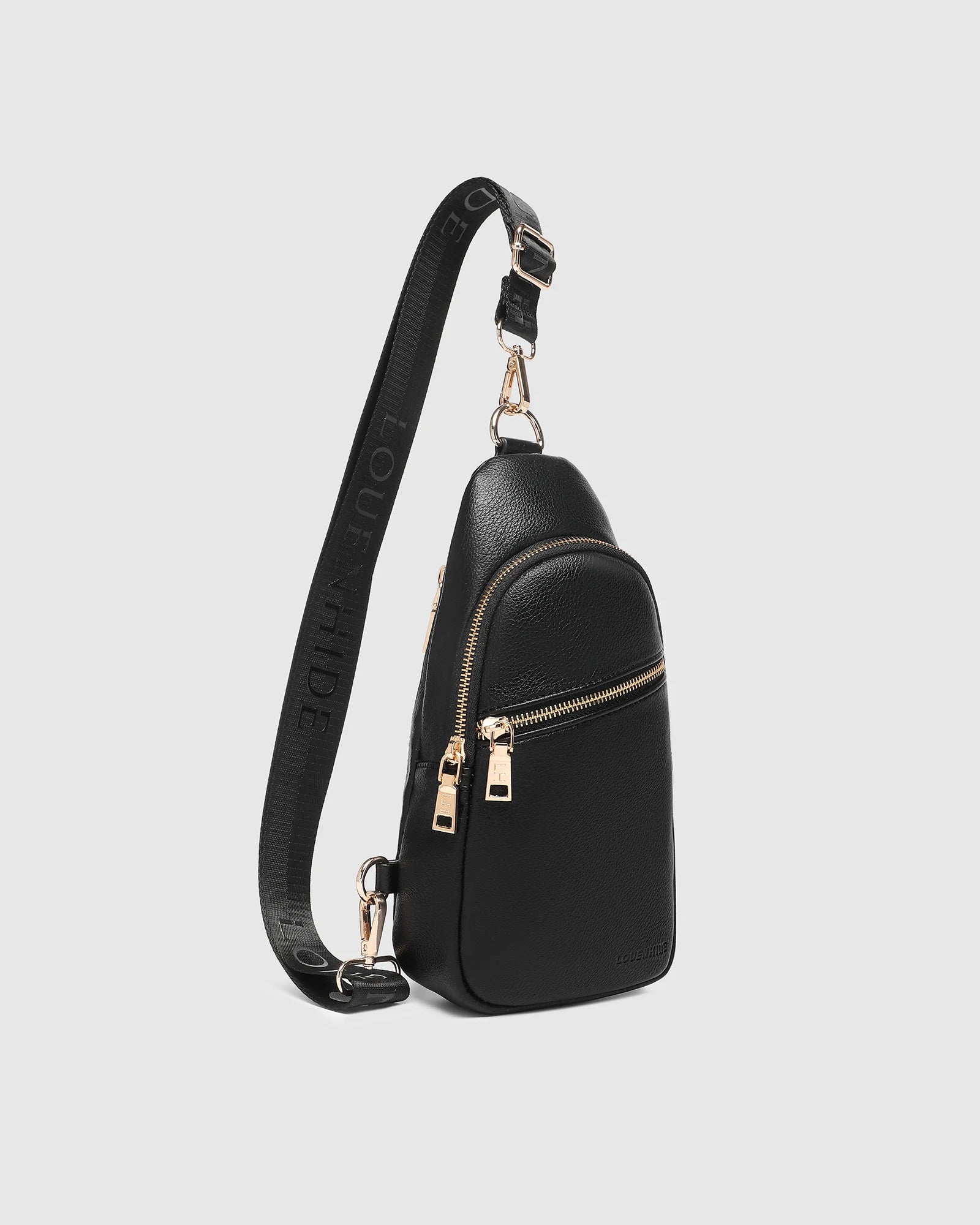 The Louenhide Bella Sling Bag is designed with both style and functionality in mind. Travel organization has never been easier with the dual compartment design ensuring your valuables are within reach and secured safely with the zip closures. Featuring an adjustable and detachable strap allows you to choose the way your bag slings. Whether over your left or right shoulder, this faux leather sling bag ensures comfortable all-day wear. This small sling backpack adds a refined touch to any casual outfit, enhan