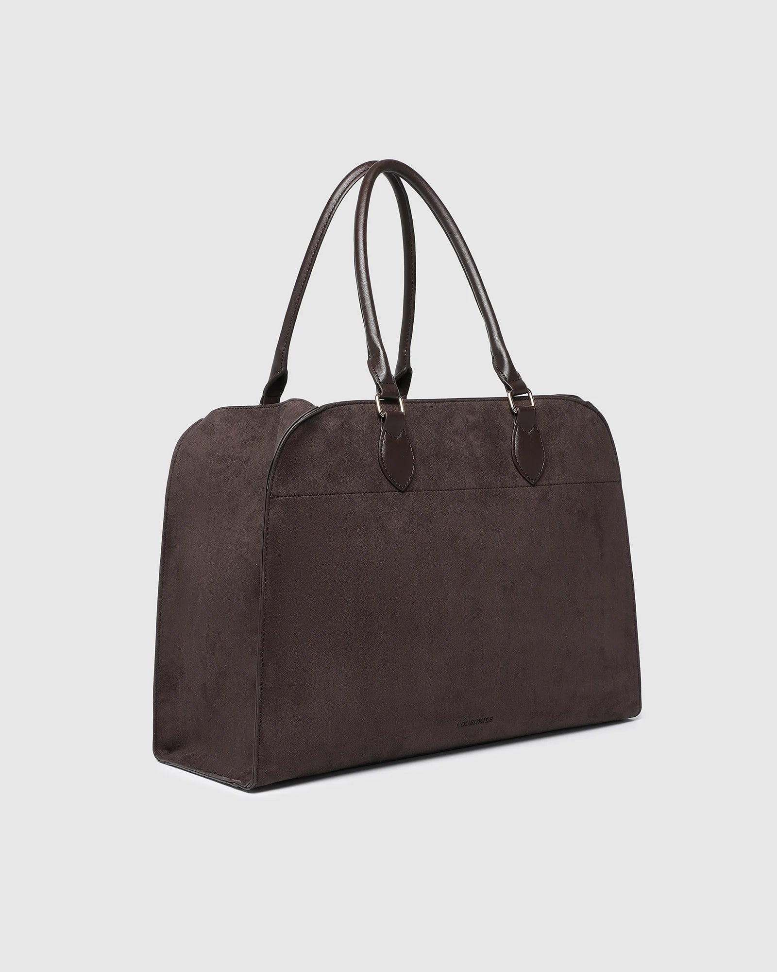 The Louenhide Blaire Tote Bag is the definition of an effortless, statement style. Designed with a bold and unique silhouette, this large tote bag is the perfect throw and go piece with an elevated edge. Designed to have a spacious interior, you can easily fit your daily essentials – and then some. Whether en route to work or heading out for the day, wear it over the shoulder or carry in hand, and let the day unfold. A refined take on an everyday essential, the Blaire Tote Bag blends structure and softness