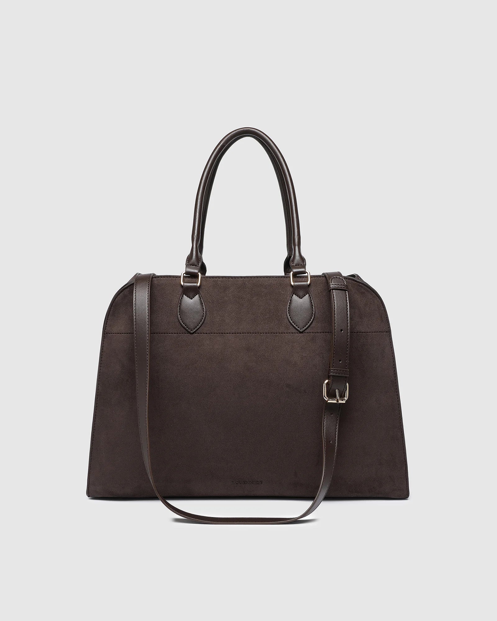 The Louenhide Blaire Tote Bag is the definition of an effortless, statement style. Designed with a bold and unique silhouette, this large tote bag is the perfect throw and go piece with an elevated edge. Designed to have a spacious interior, you can easily fit your daily essentials – and then some. Whether en route to work or heading out for the day, wear it over the shoulder or carry in hand, and let the day unfold. A refined take on an everyday essential, the Blaire Tote Bag blends structure and softness