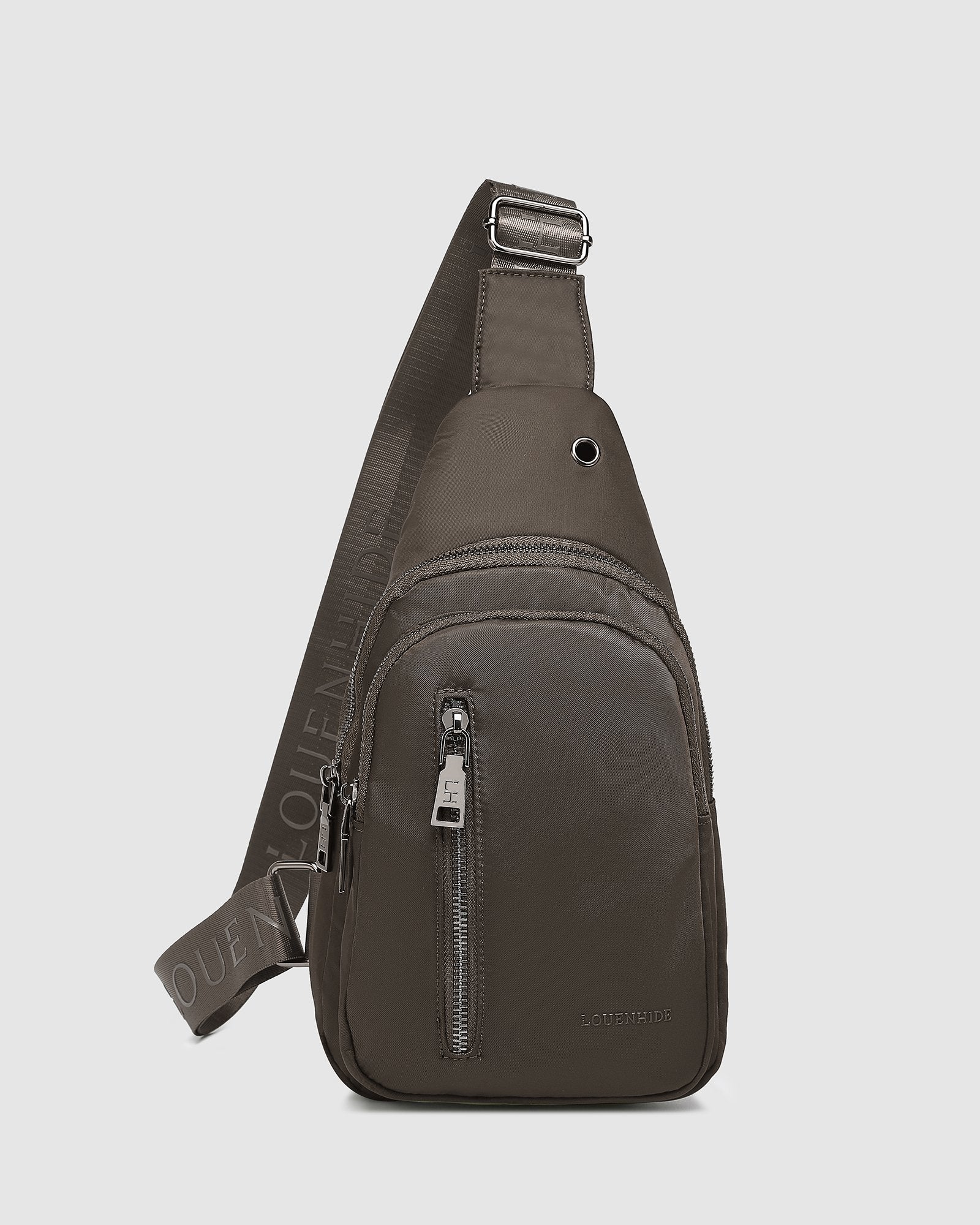 The Louenhide Boyd Nylon Sling Bag is an on-trend unisex sling bag designed with both style and functionality in mind. Organisation has never been easier with the three-section design, your valuables are within easy reach and secured safely with the stylish gunmetal zippers. Whether you're chasing an urban aesthetic or embodying an off-duty street style, this unisex nylon sling bag adapts to any casual outfit, enhancing your personal style while still offering ultimate practicality. The Boyd Khaki features