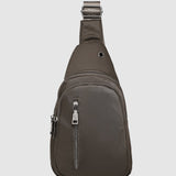 The Louenhide Boyd Nylon Sling Bag is an on-trend unisex sling bag designed with both style and functionality in mind. Organisation has never been easier with the three-section design, your valuables are within easy reach and secured safely with the stylish gunmetal zippers. Whether you're chasing an urban aesthetic or embodying an off-duty street style, this unisex nylon sling bag adapts to any casual outfit, enhancing your personal style while still offering ultimate practicality. The Boyd Khaki features