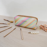 The Louenhide Brianna Makeup Bag is the perfect addition to your beauty routine. Exude style on your next adventure with the visually captivating pattern. Complete with a set of makeup brushes, this women’s small makeup bag is the perfect size for travel.